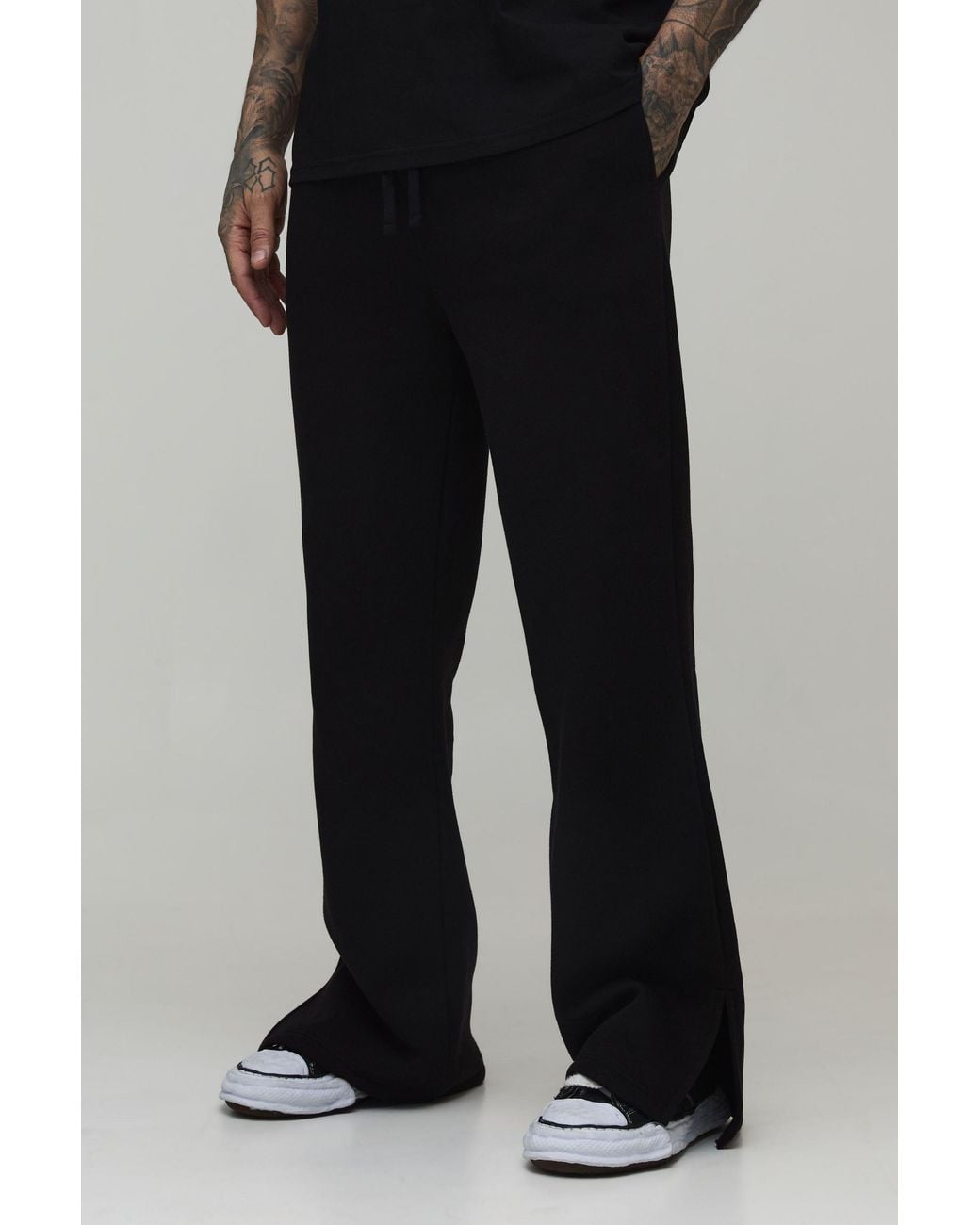 BoohooMAN Black Tall Baggy Flared Fit Split Hem Joggers for men