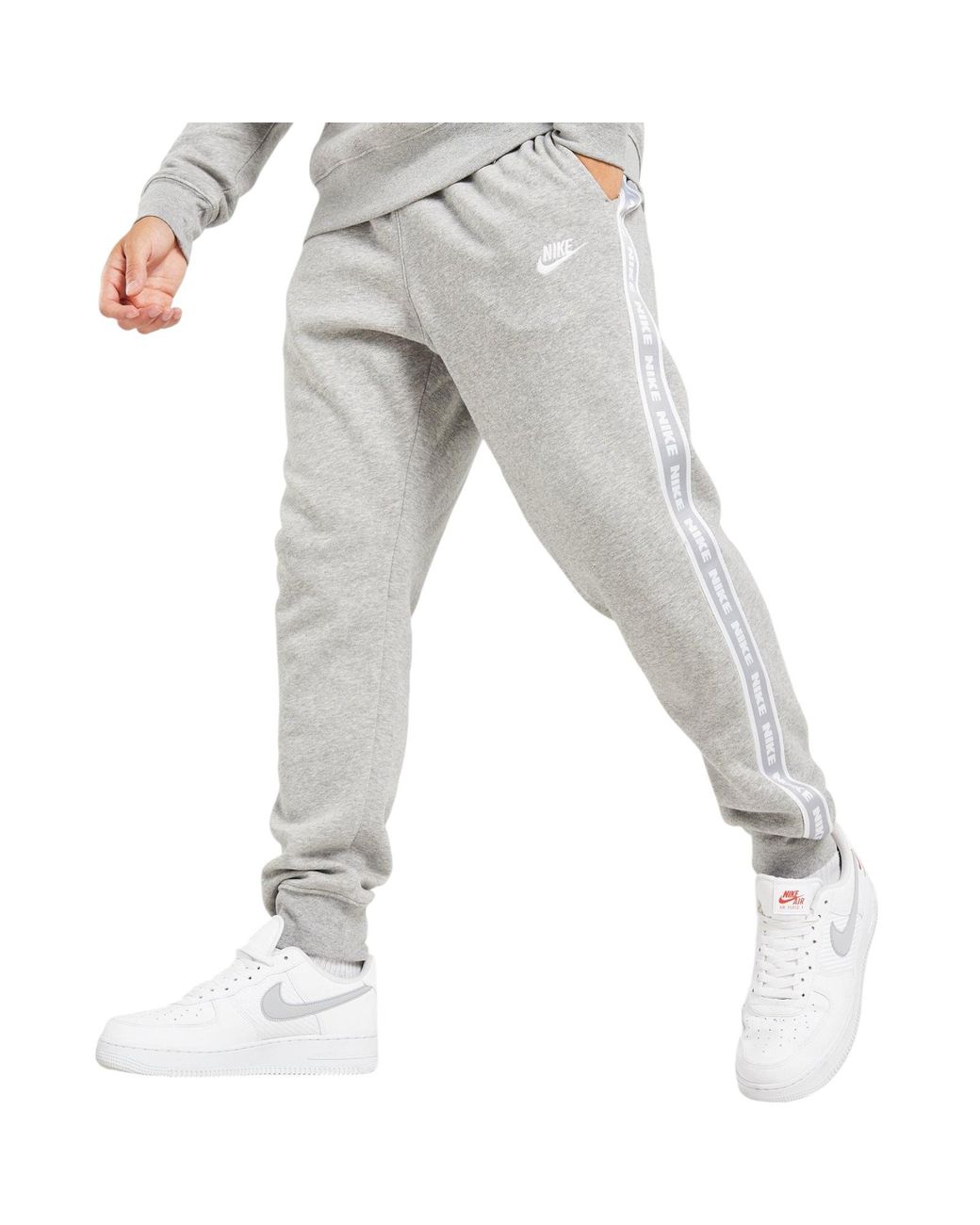 nike grey tape joggers