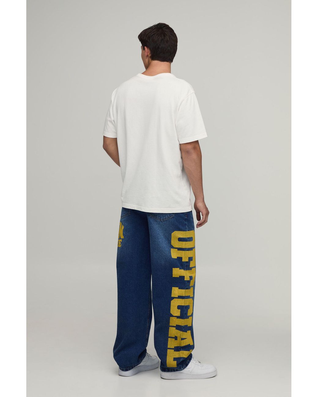 BoohooMAN Blue Relaxed Rigid Official Varsity Print Denim Jeans for men