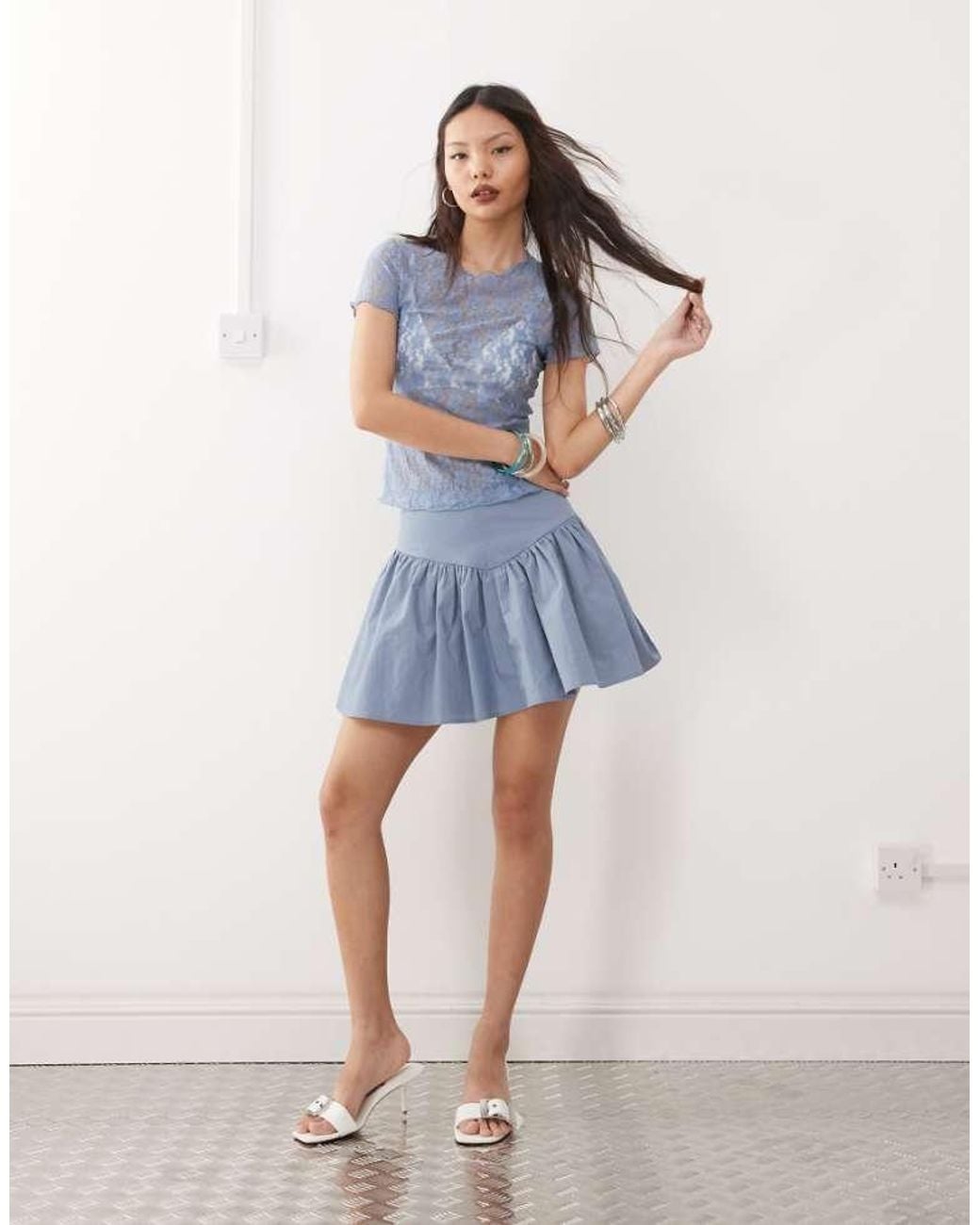 Amy Lynn Blue V-Waist Frill Mini Skirt