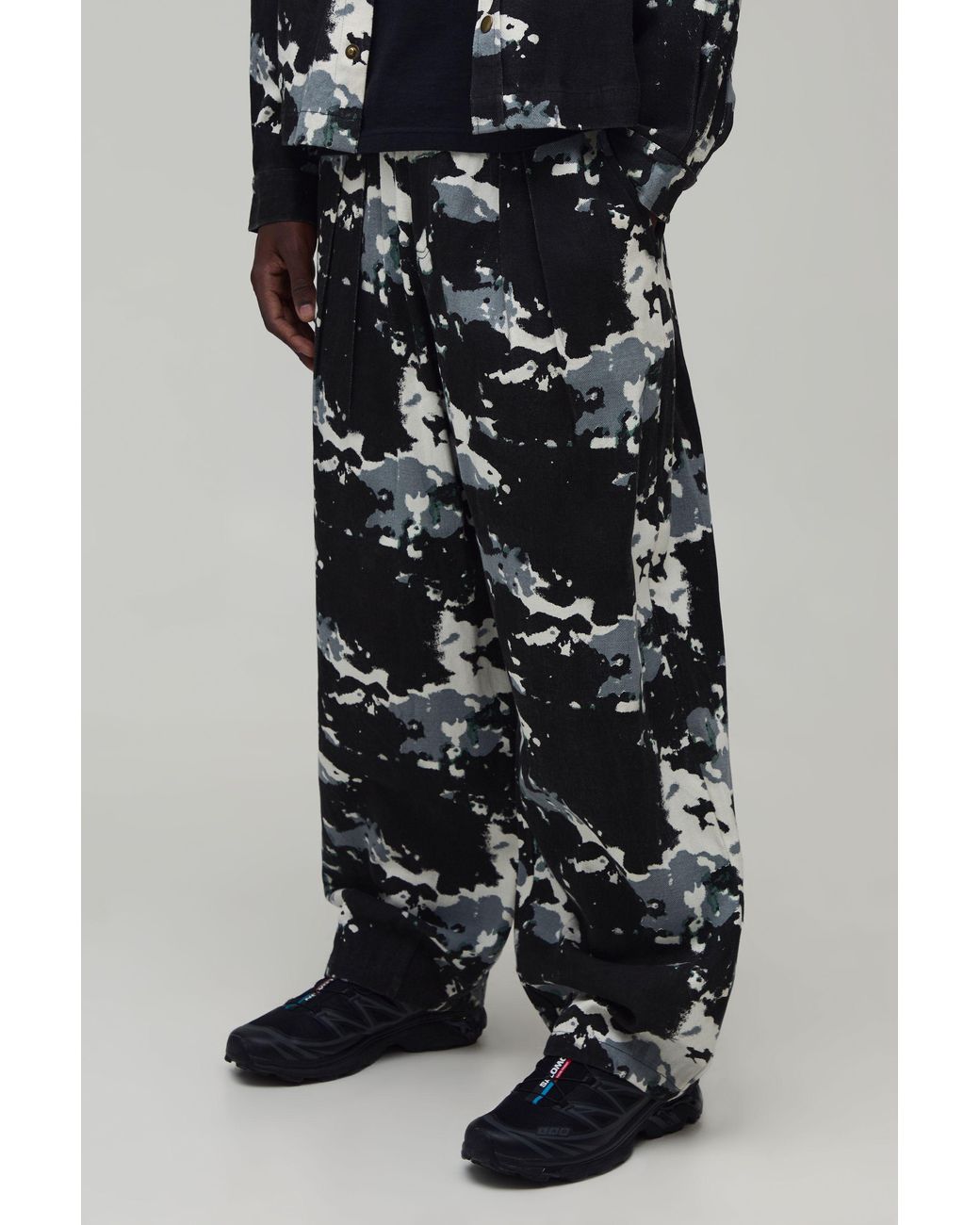 BoohooMAN Black Balloon Fit Distorted Camo Print Twill Trousers for men