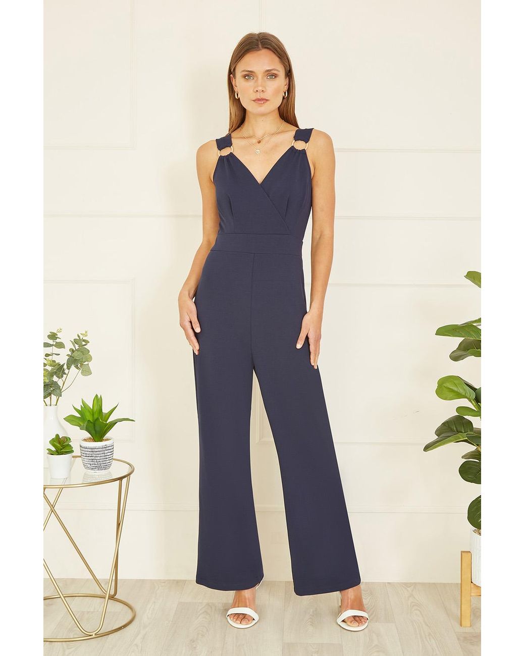 Mela London Stretch Jumpsuit With Buckle Details in Blue Lyst UK