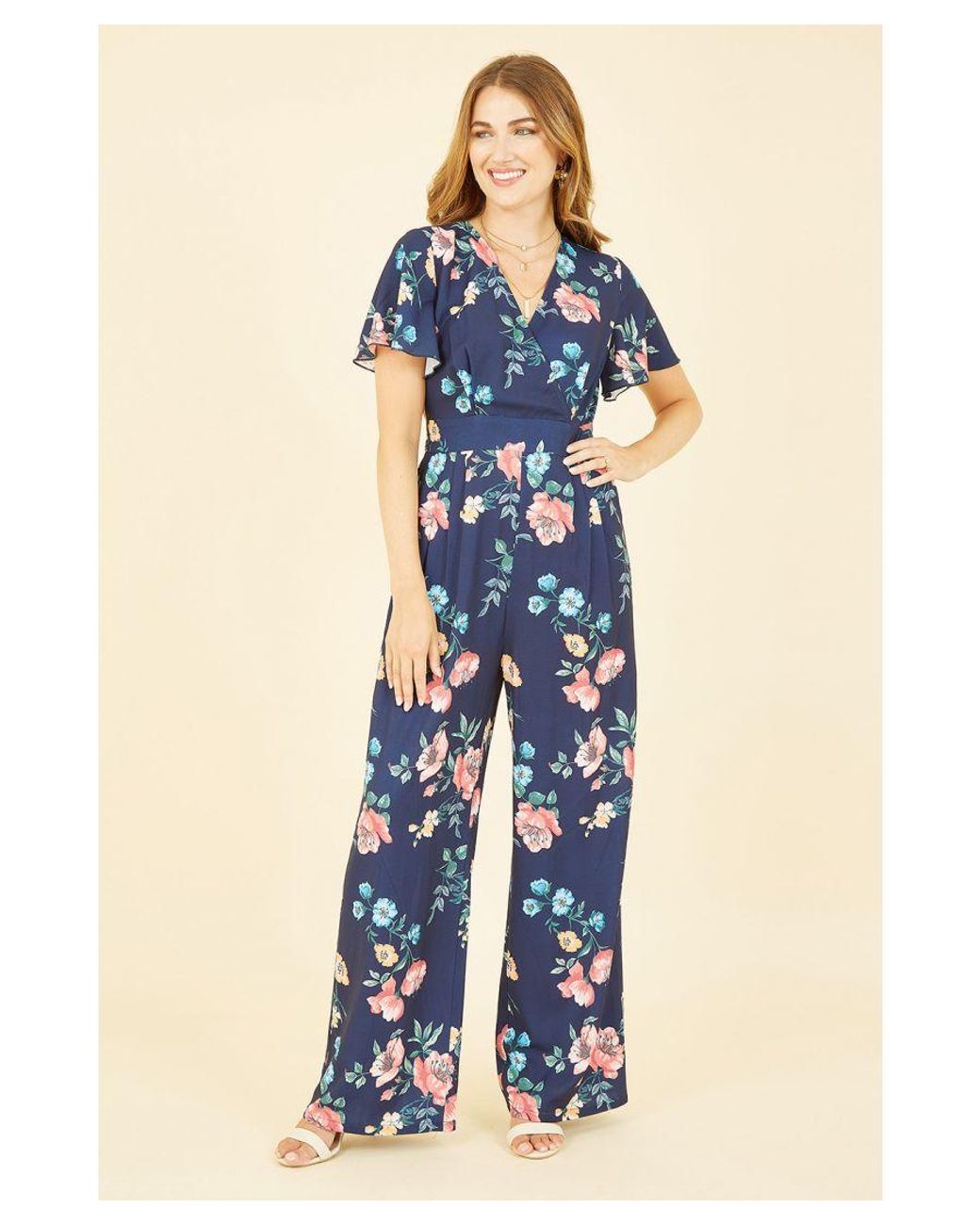 Yumi' Blue Floral Angel Sleeve Jumpsuit