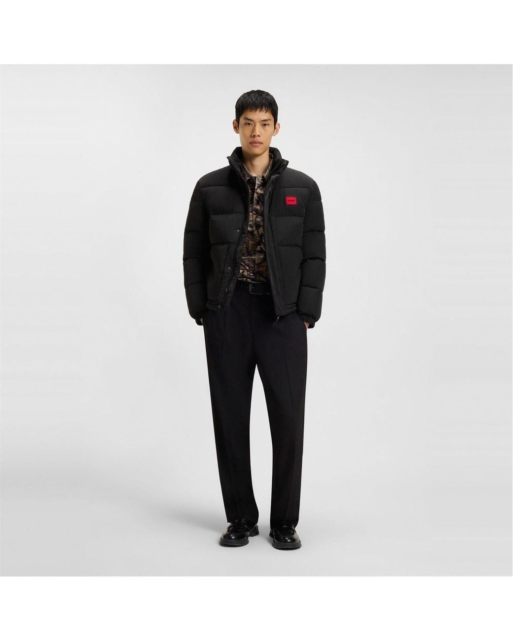 HUGO Black Solid Patterned Puffer Coat With Chest Pocket for men