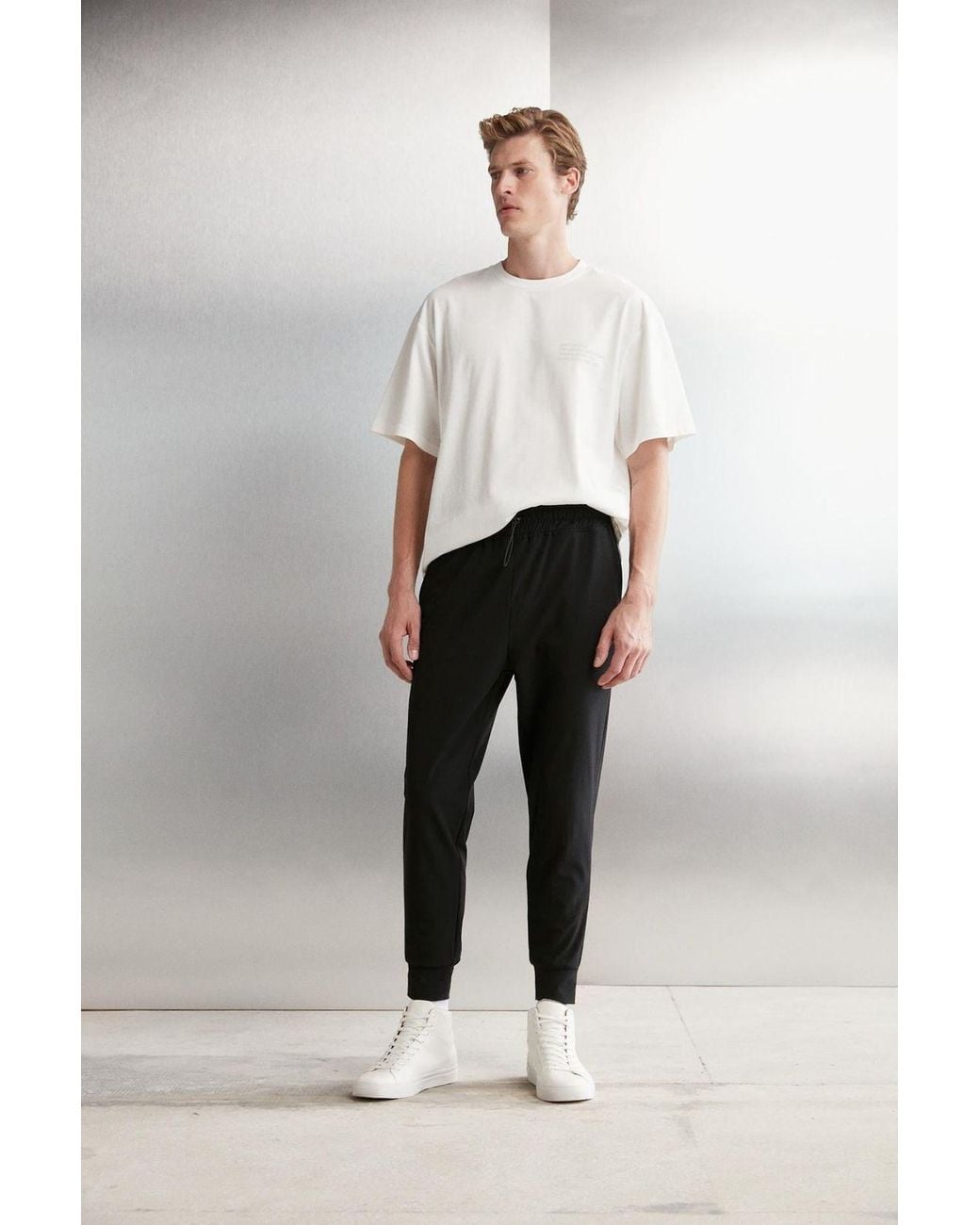 Grimelange Black Mid Waist Ankle Jogger Pants for men