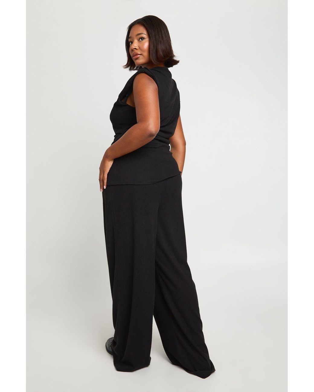 Boohoo Black Plus Shoulder Pad Pleated Detail Asym Hem Top And Wide Leg Trousers