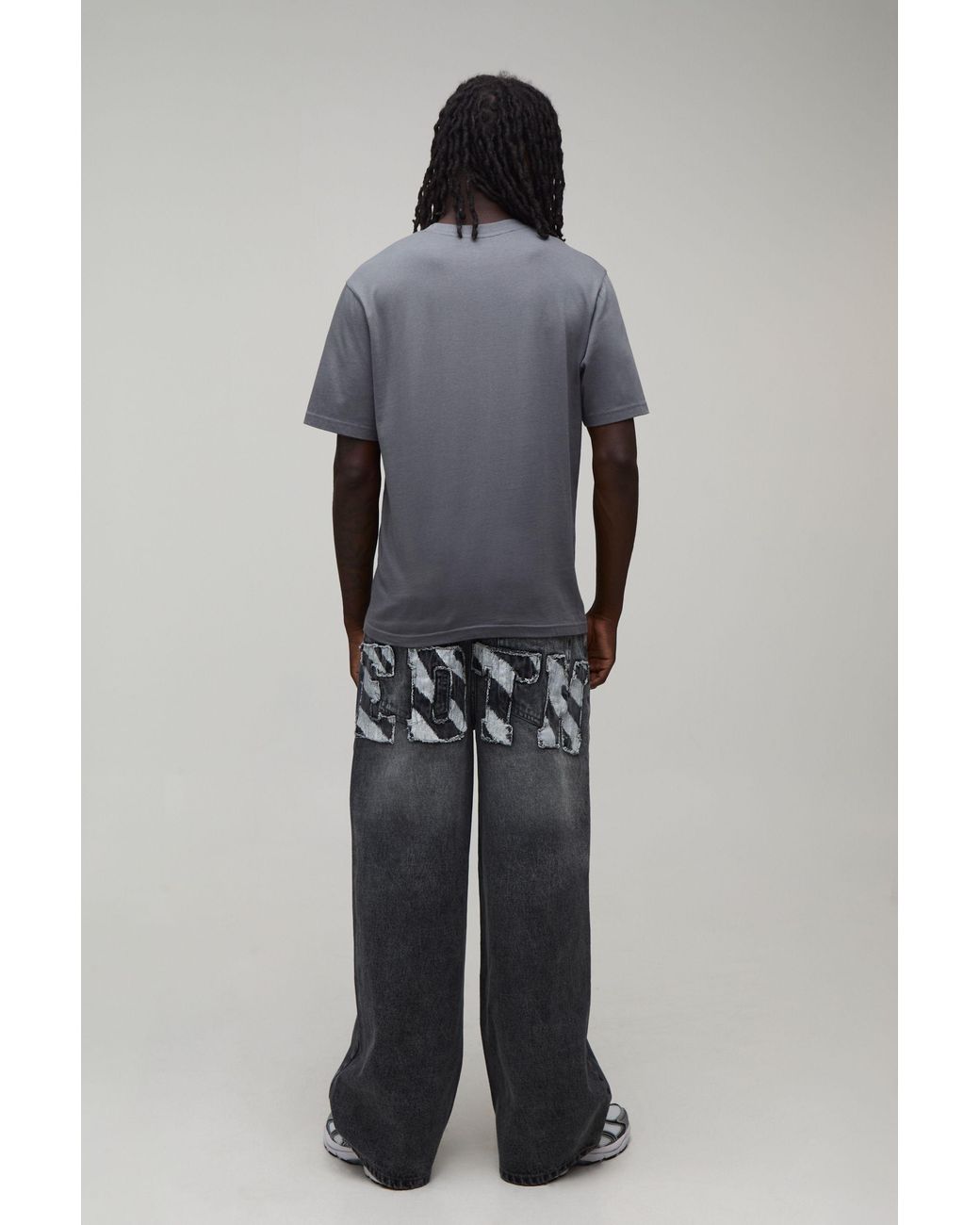 BoohooMAN Black Zebra Applique Baggy Fit Jeans for men