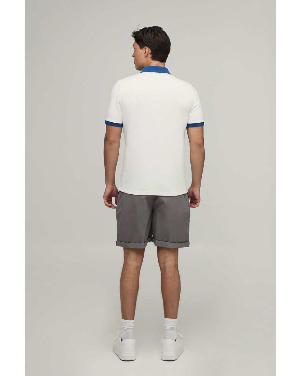 BoohooMAN Blue Slim Panelled Zip Neck Interlock Polo for men