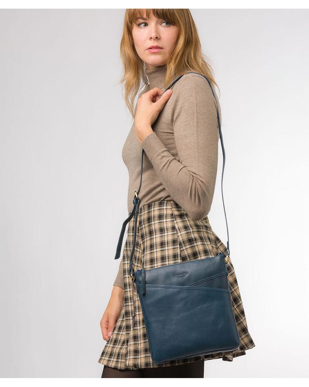 Conkca Blue 'Avril' Snorkel Leather Cross Body Bag