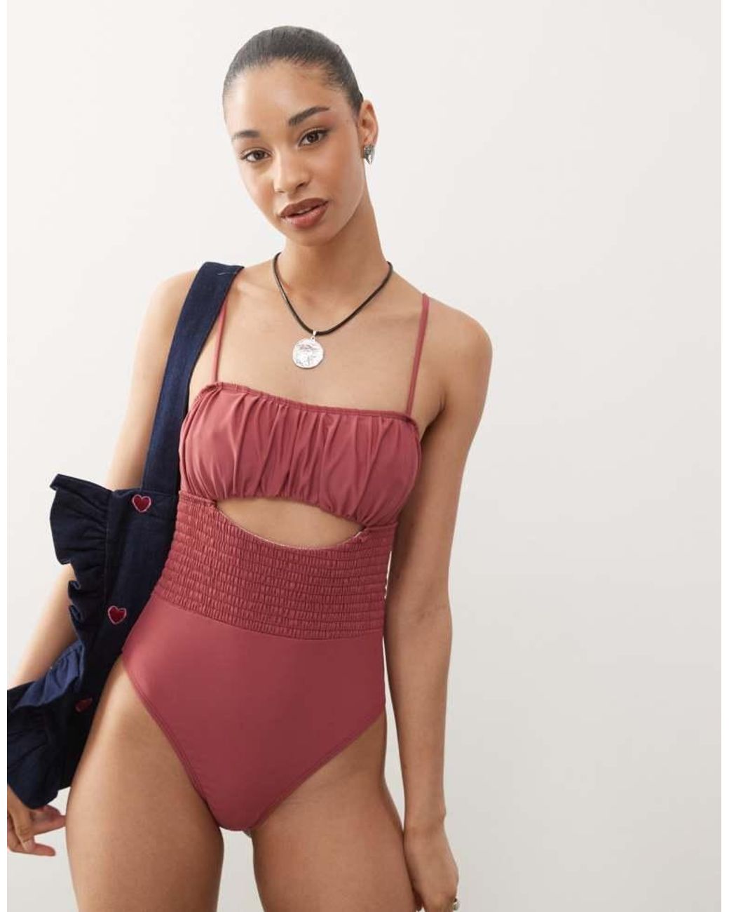 Reclaimed Vintage Pink Swimsuit With Shirred Waist And Cut Out Detail