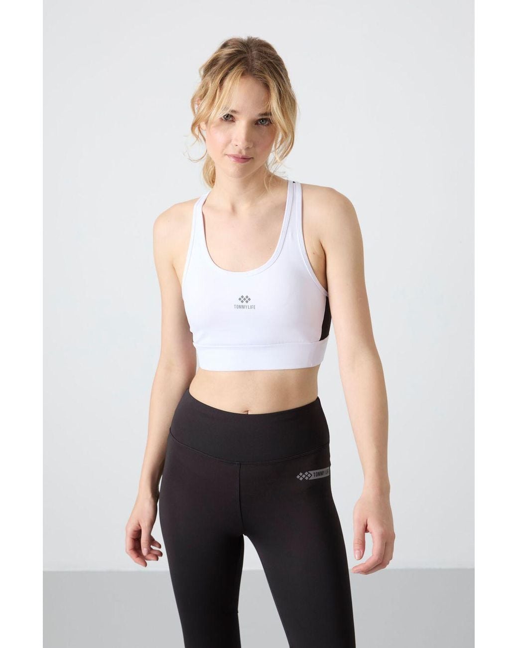TOMMY LIFE White Fitted Sleeveless Crop Sports Top
