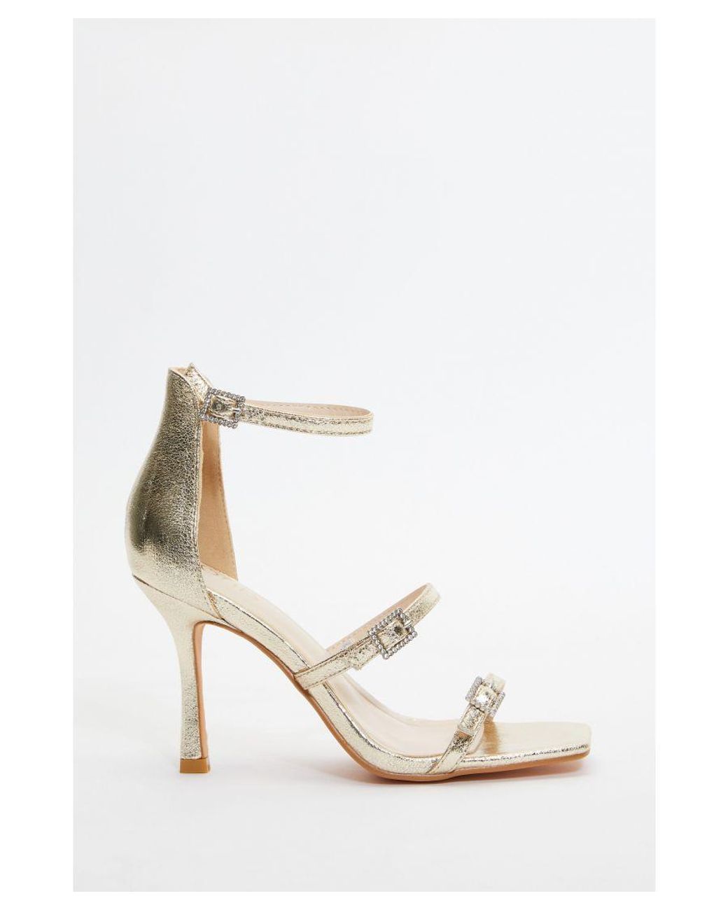 Quiz top gold heels