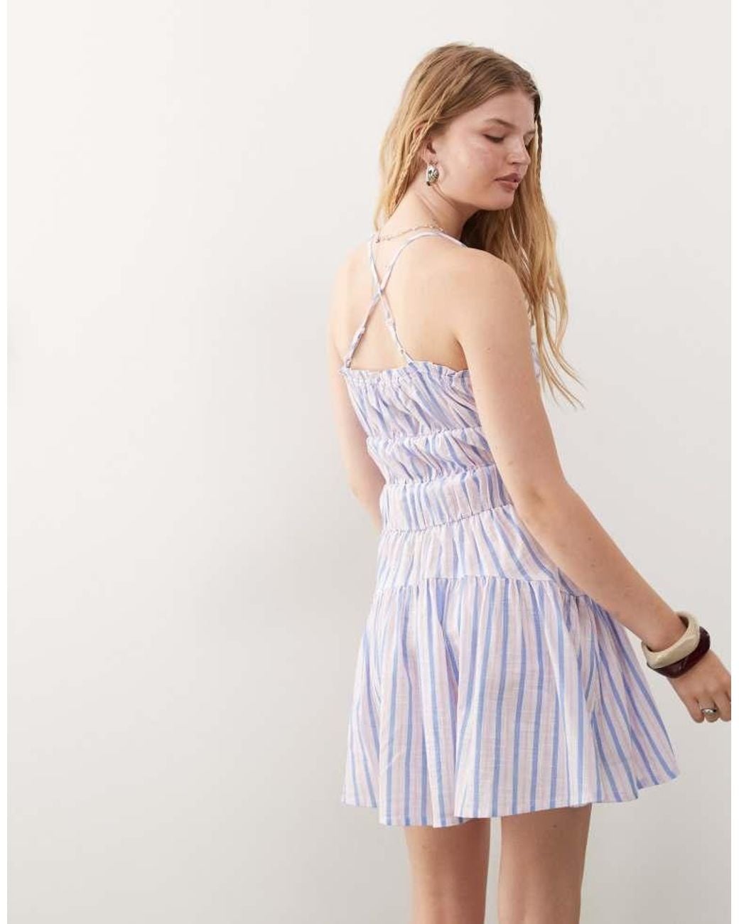 Reclaimed Vintage White Mini Sun Dress With Ruching And Cross Back Detail