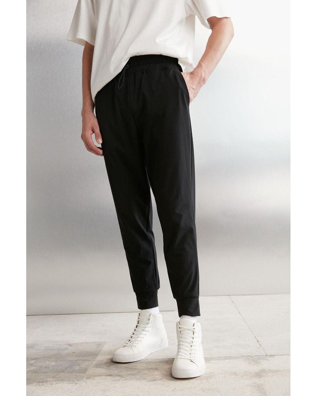 Grimelange Black Mid Waist Ankle Jogger Pants for men