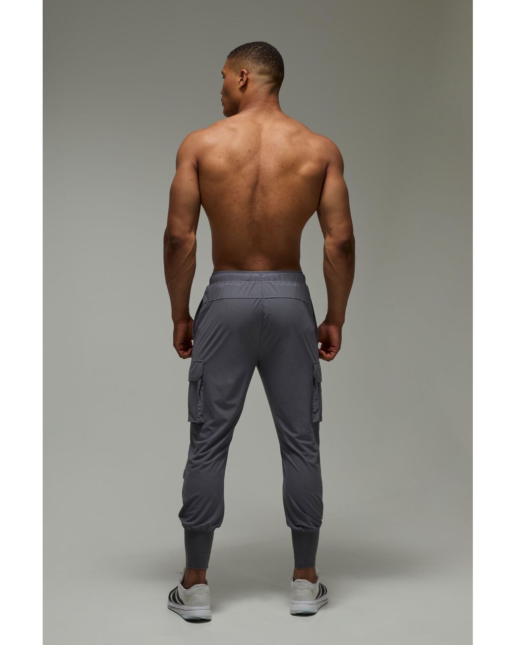 BoohooMAN Black Active Slim Fit Cuffed Cargo Jogger for men