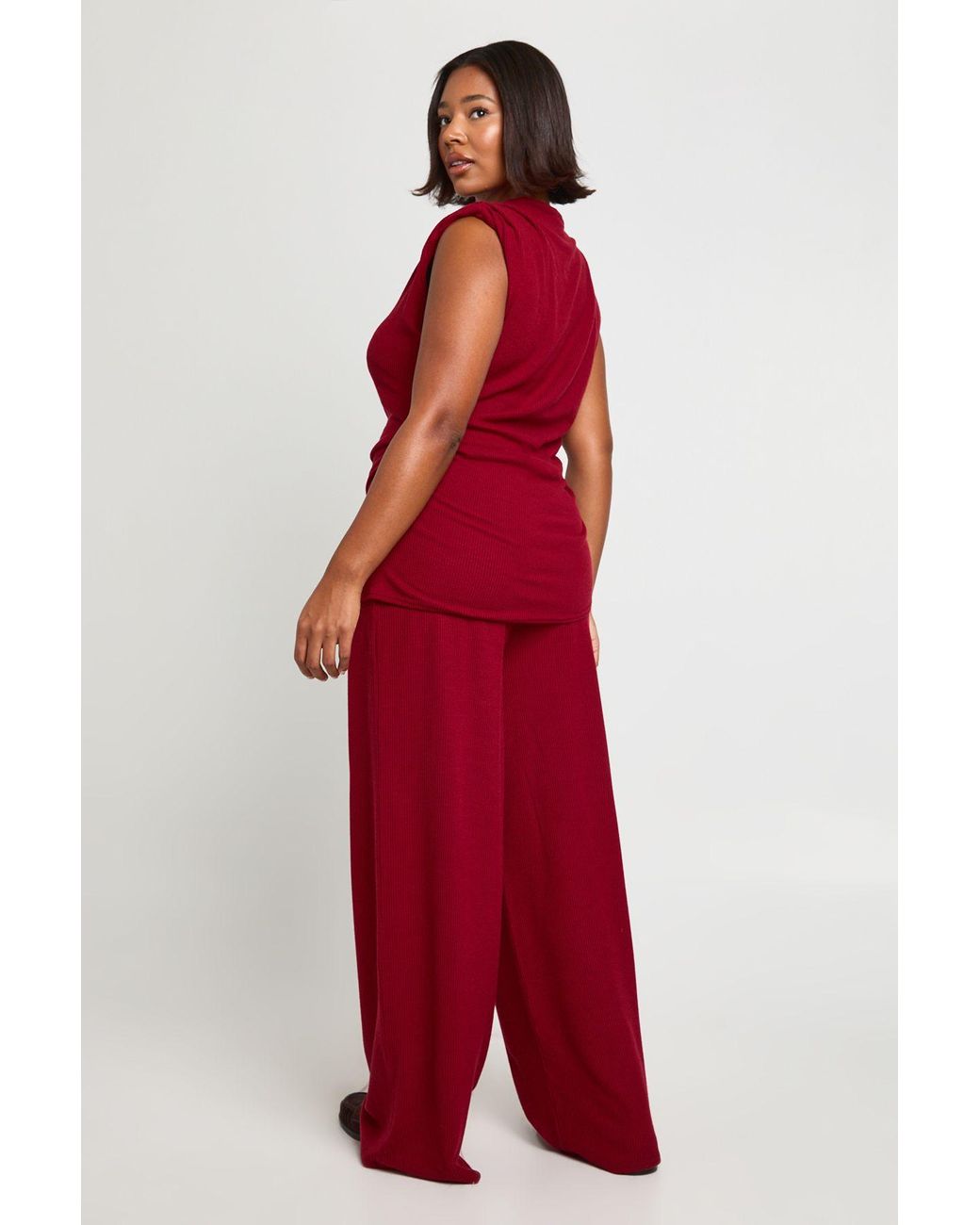 Boohoo Red Plus Shoulder Pad Pleated Detail Asym Hem Top And Wide Leg Trousers