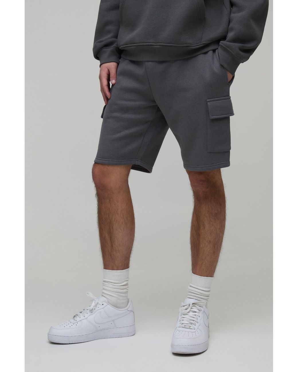BoohooMAN Black Basic Slim Fit Cargo Jersey Short for men