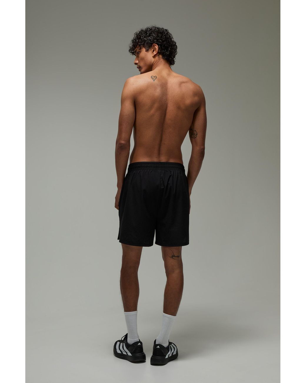 BoohooMAN Black Common Pace Running Perforated 5Inch Short for men