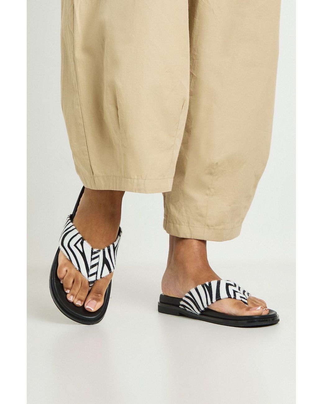 Boohoo Natural Zebra Print Footbed Flip Flops