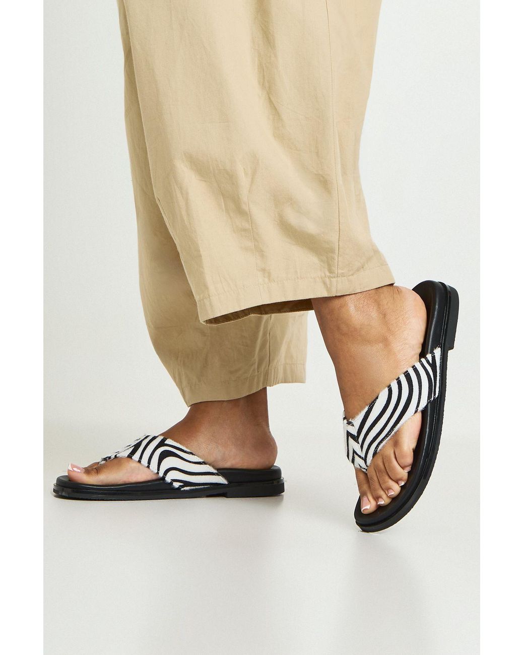 Boohoo Natural Zebra Print Footbed Flip Flops