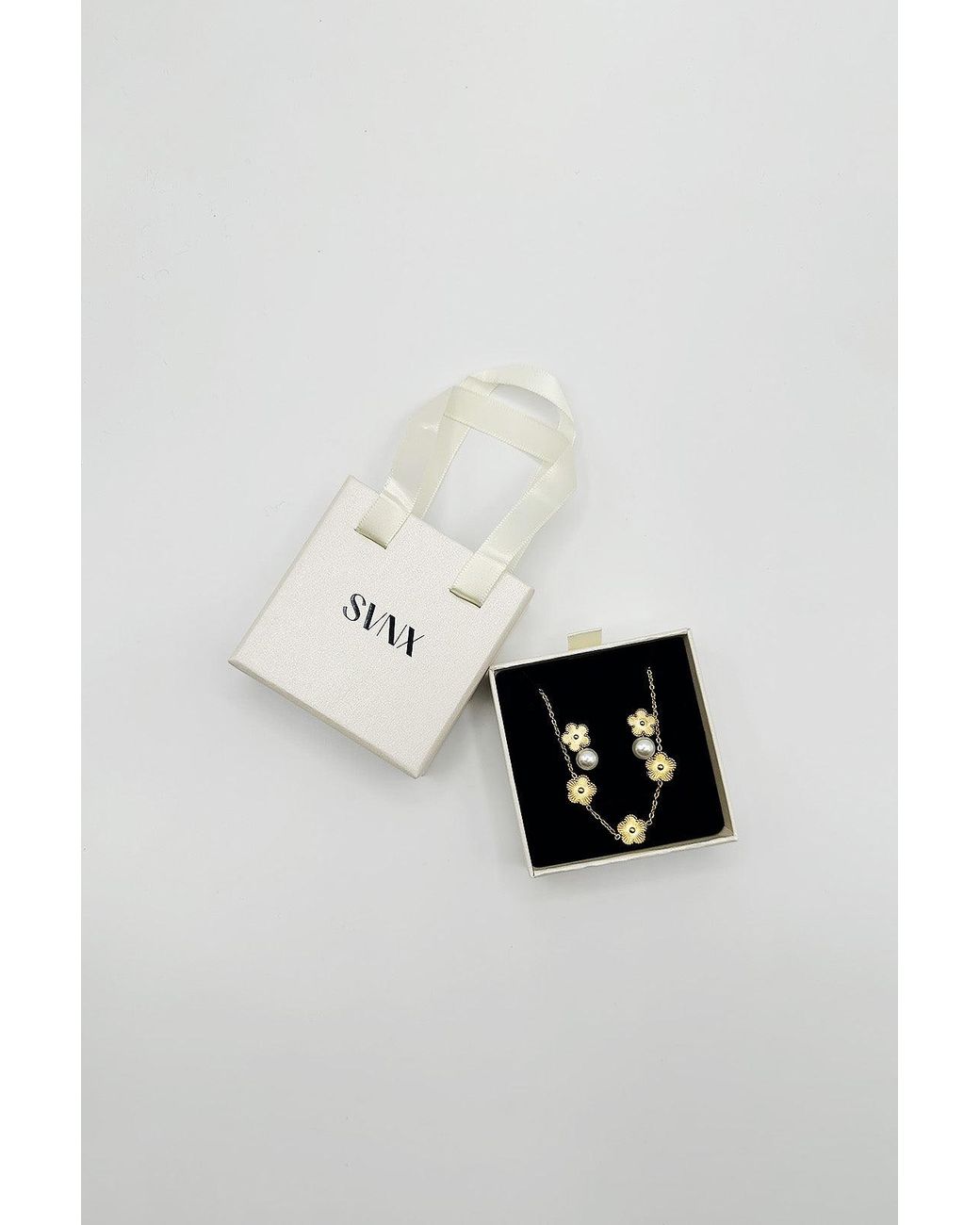 SVNX Black Floral Pearl Stud Earrings & Bracelet