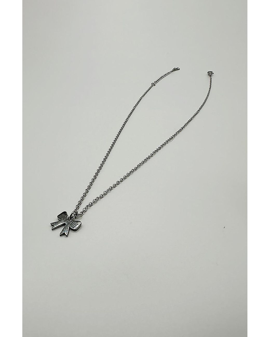 SVNX Gray Mini Bow Pendant Necklace