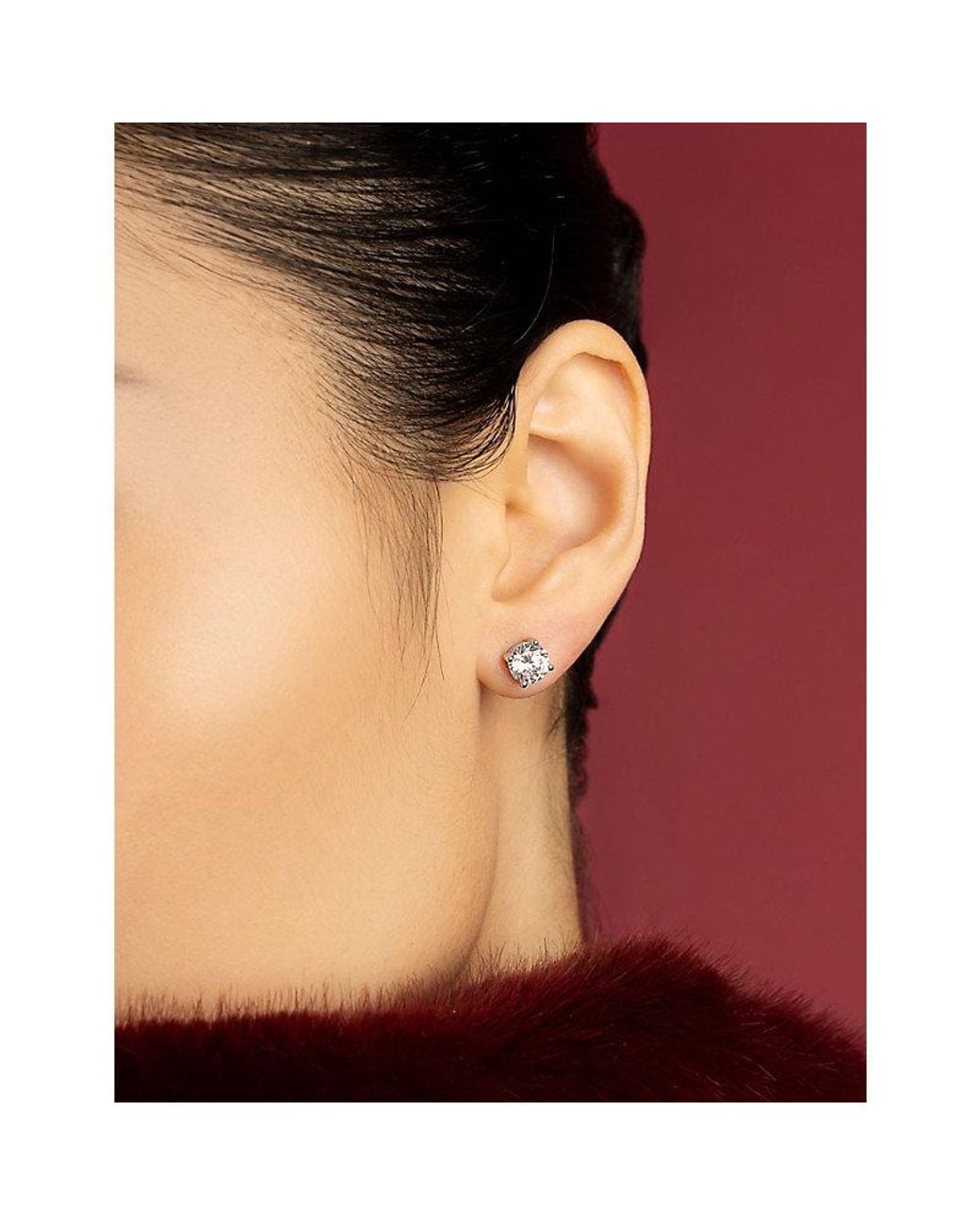 Apm Monaco White Lumiere Rhodium Plated Alloy And Cubic Zirconia Tennis Stud Earrings