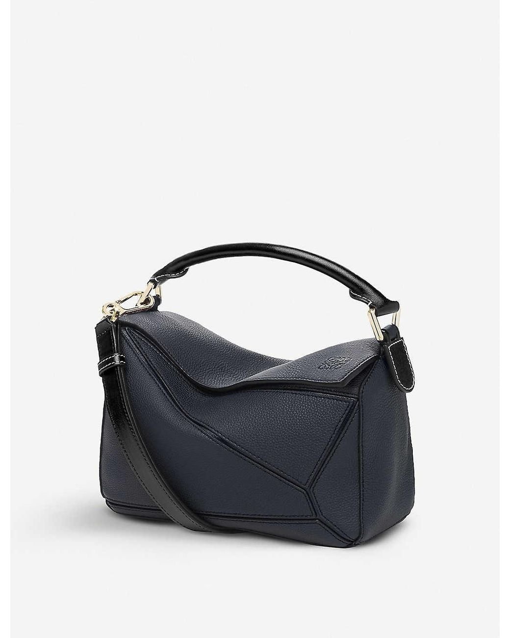 Got my dream Loewe small puzzle bag in midnight navy/black, pre-loved but  in stellar condition! I wanted one in a dark color with gold hardware and  this was one of the only