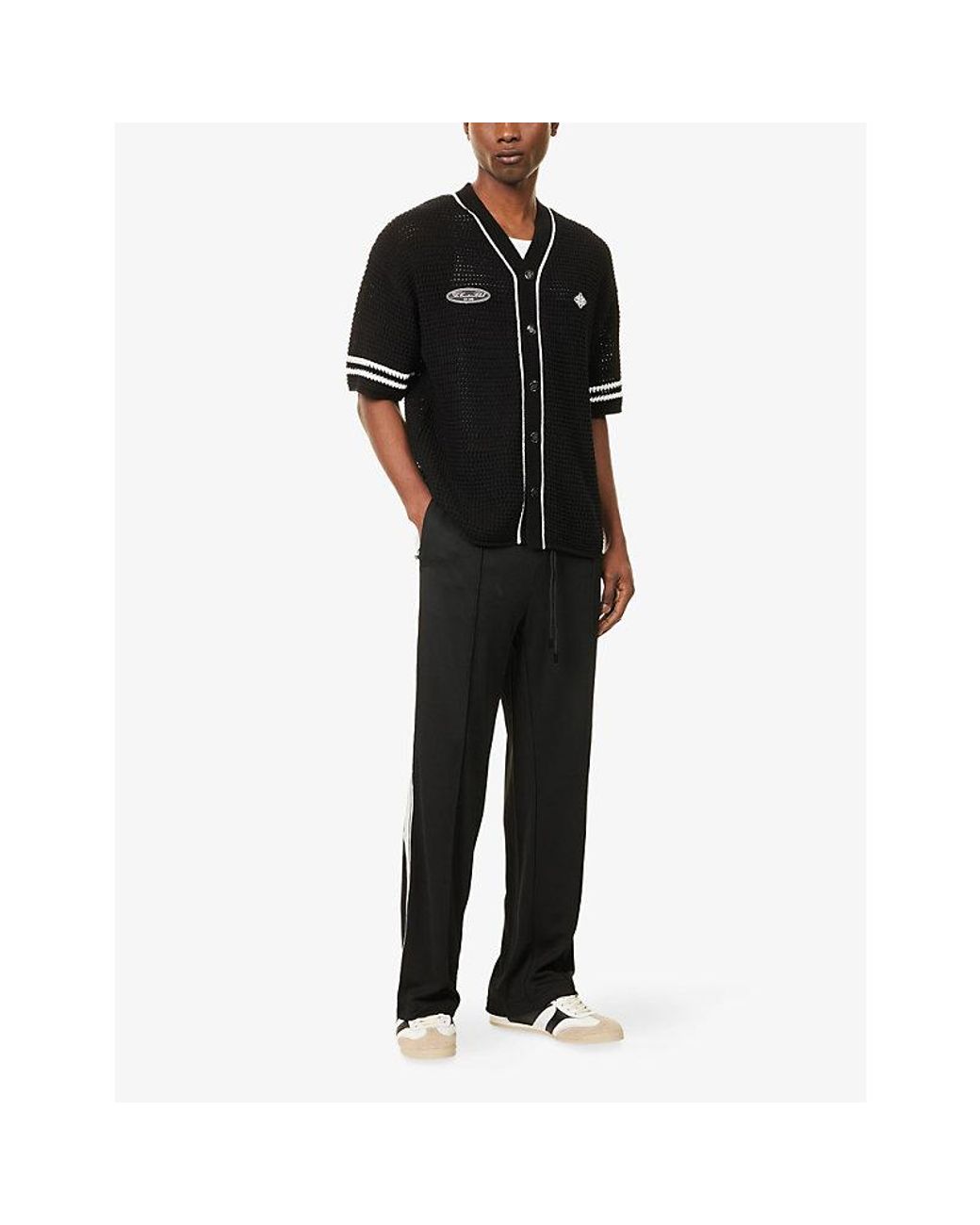 The Couture Club Black Tape Mesh Jogging Bottoms for men