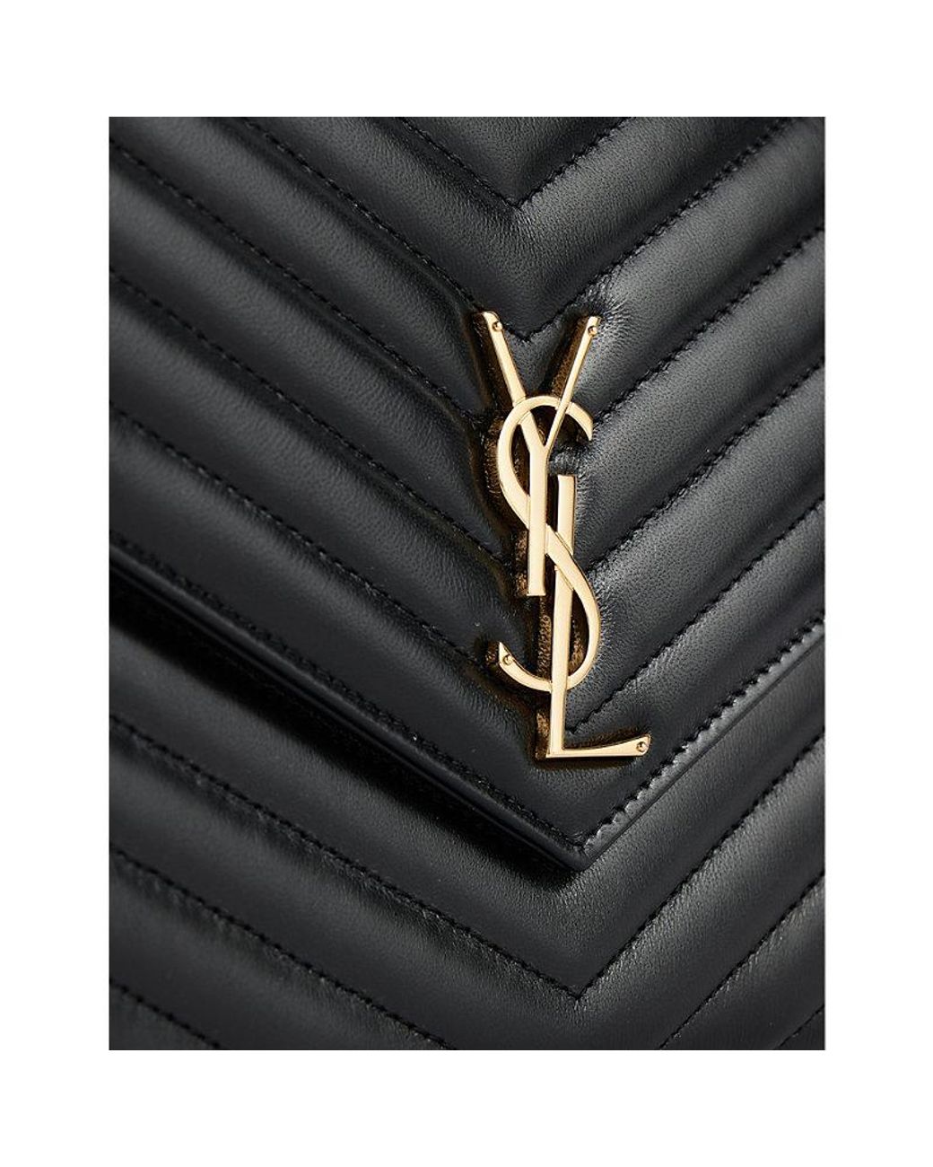Monogram quilted leather clutch 2025