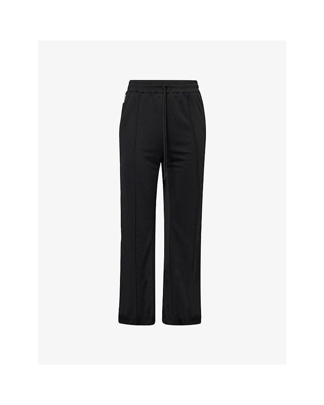 The Couture Club Black Tape Mesh Jogging Bottoms for men