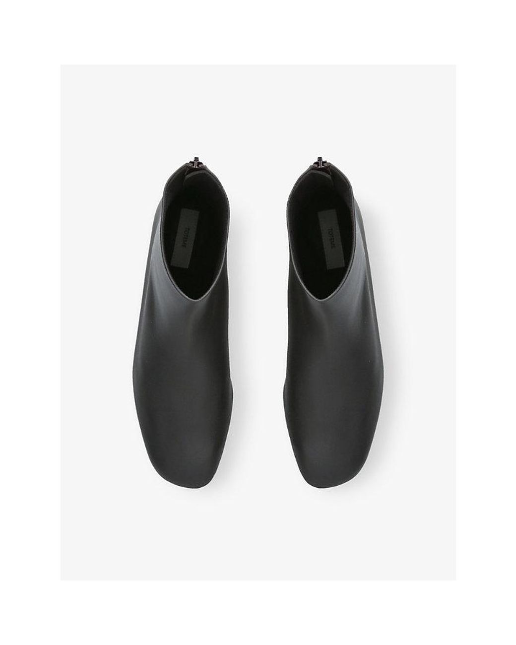 Totême Black Contour Leather Ankle Boots