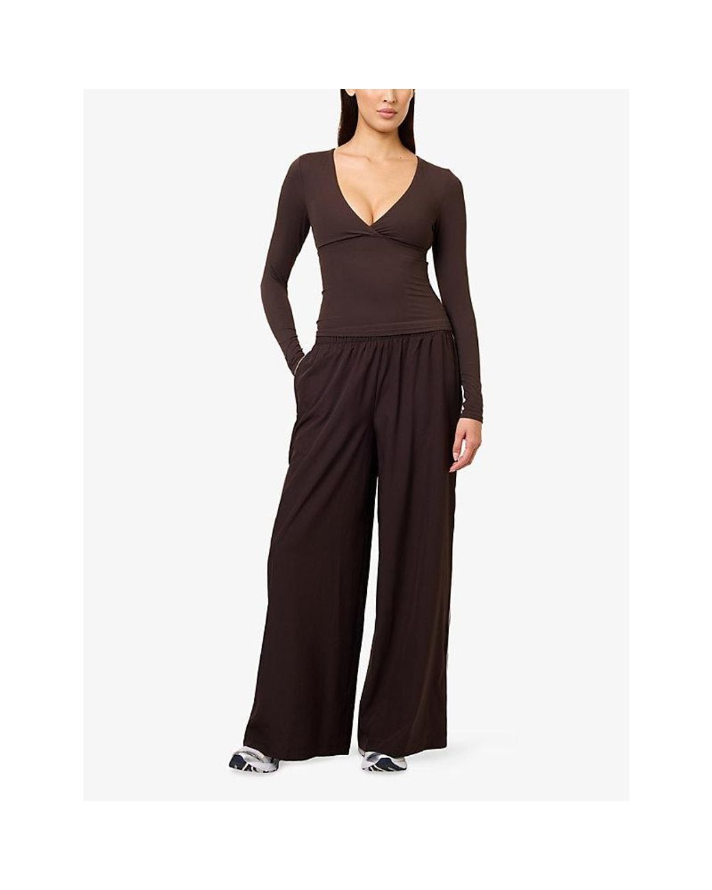 WE Are Tala Brown Dayflex V-Neck Stretch-Woven Top