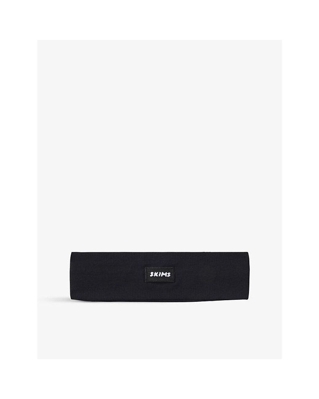 Skims Seamless Logo-embellished Stretch-nylon Headband in Black