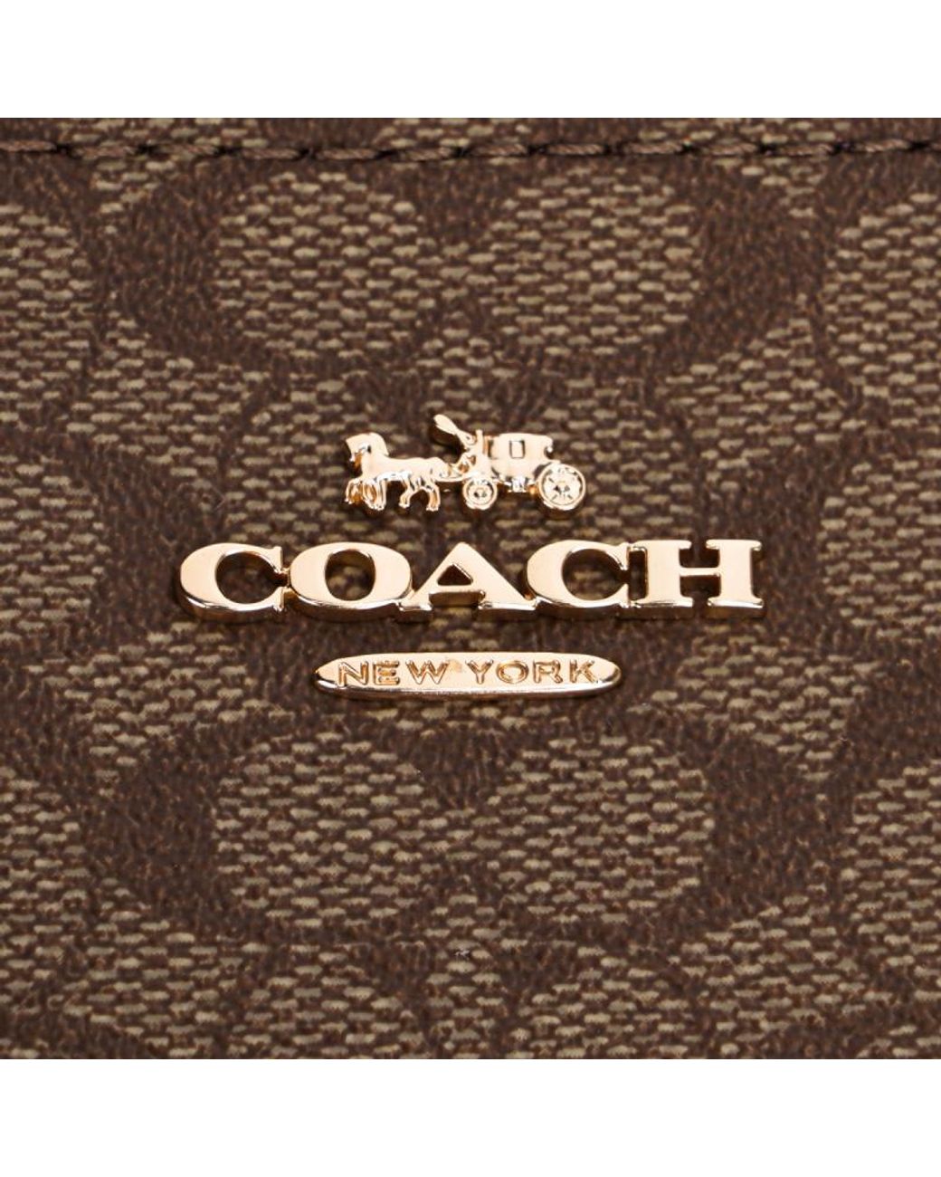 COACH Brown Zippered Clutch