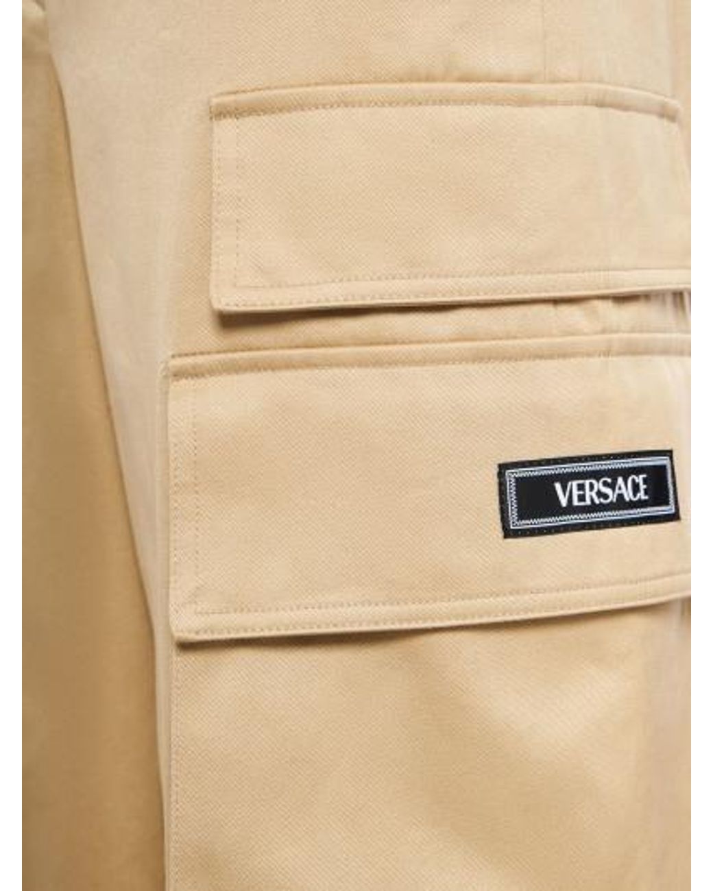 Versace Natural Logo Affixed Tooling Casual Pants