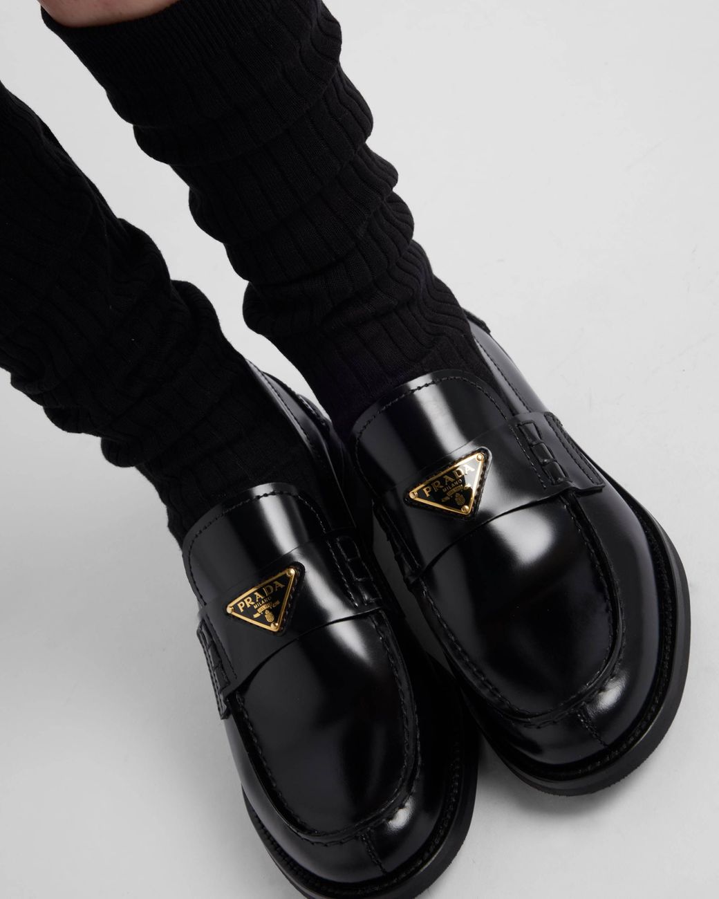 Prada Black Logo Plaque Slip-On Loafers