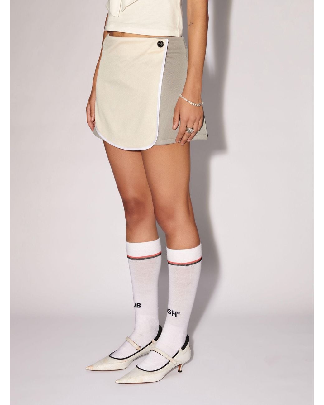 Ambush Natural Back Pleat Detailed Mini Track Skirt