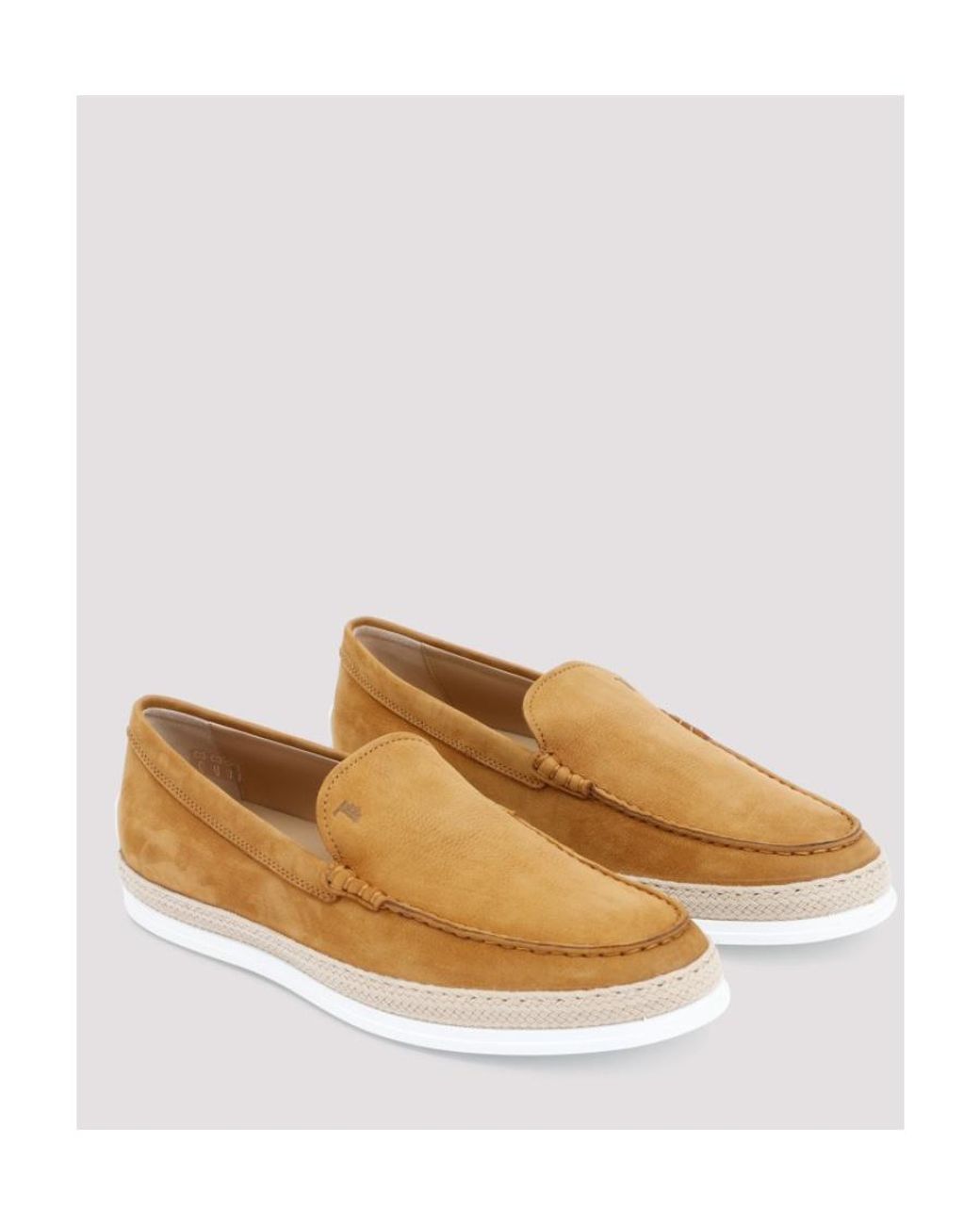 Tod's White Logo Embossed Slip-On Loafers for men