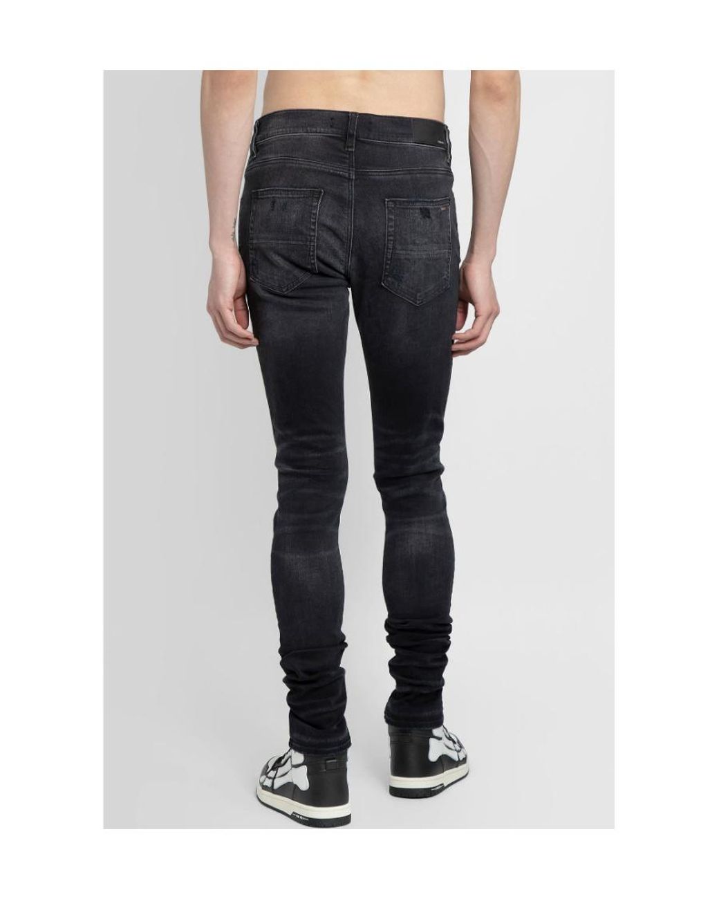 Amiri Black Distressed Skinny Jeans for men