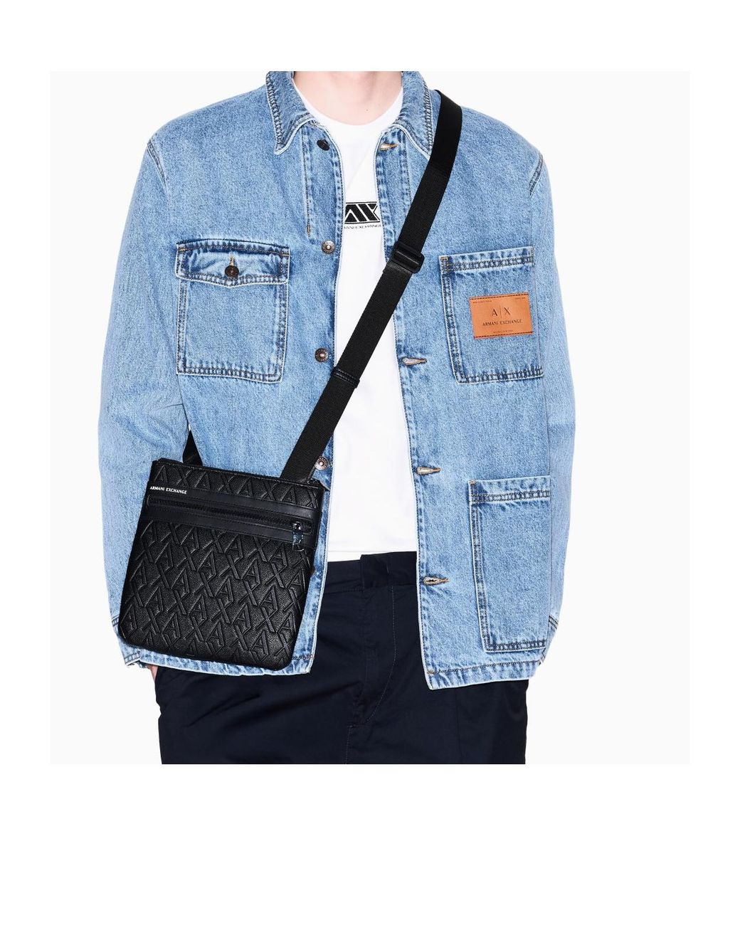 ARMANI EXCHANGE Black Monogram-Embossed Messenger Bag for men