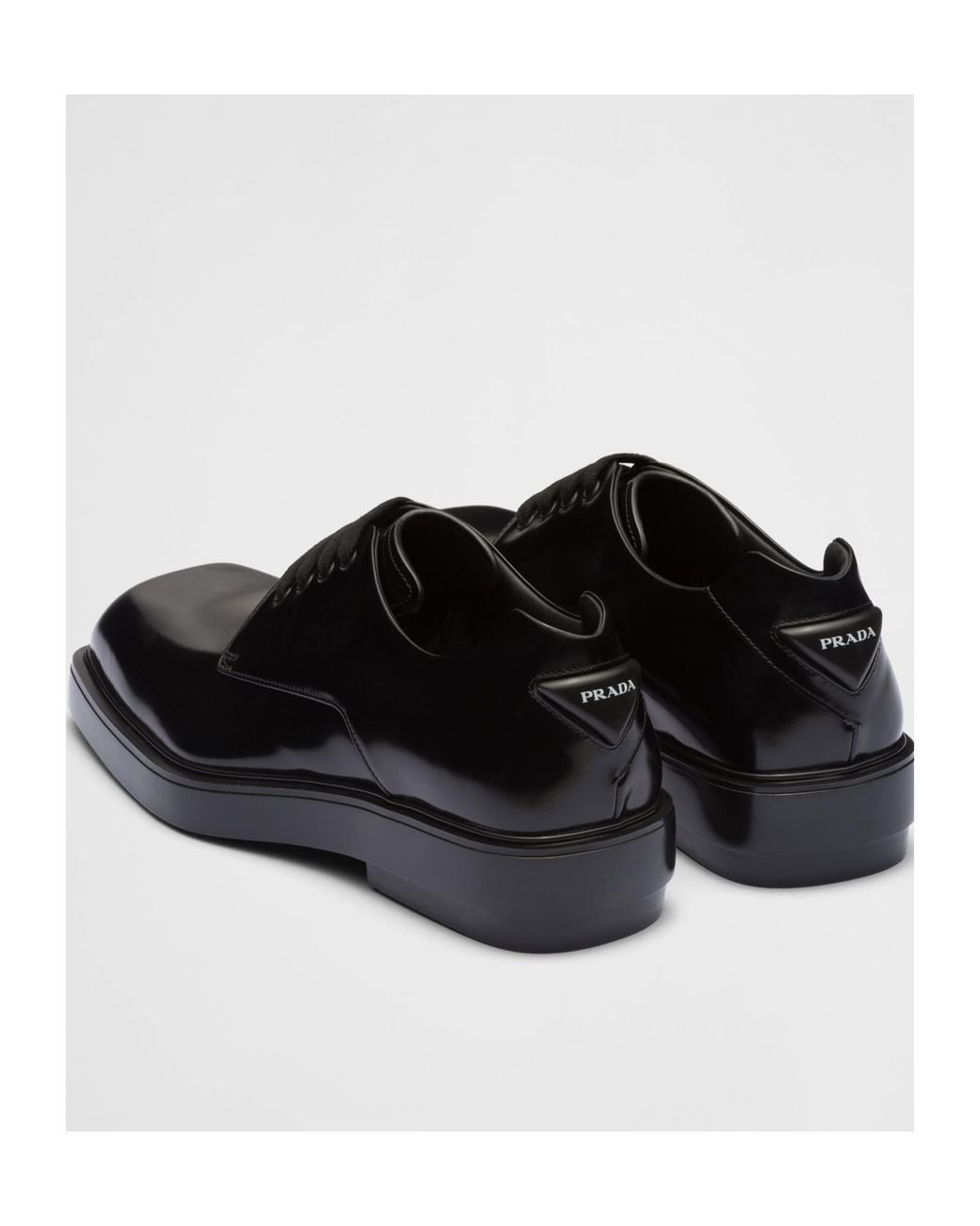 Prada Black Brushed Leather Derby Shoes for men