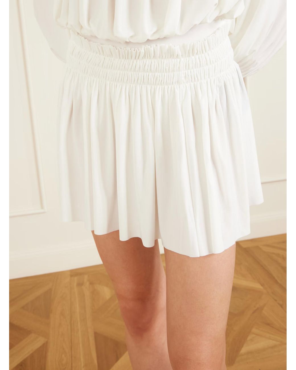 Norma Kamali White Pickleball Pleated Midi Skirt