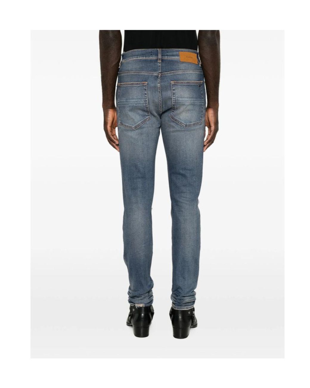 Amiri Blue Distressed Skinny Jeans for men