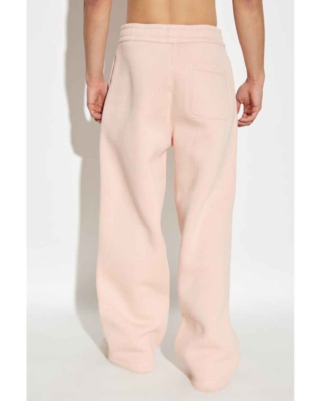 AMI Pink Ami De Coeur Logo Embossed Joggings for men