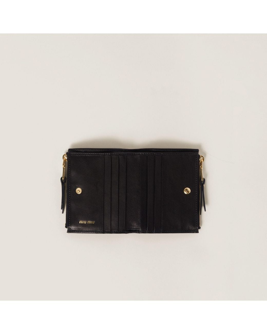 Miu Miu Black Logo Embossed Zipped Wallet