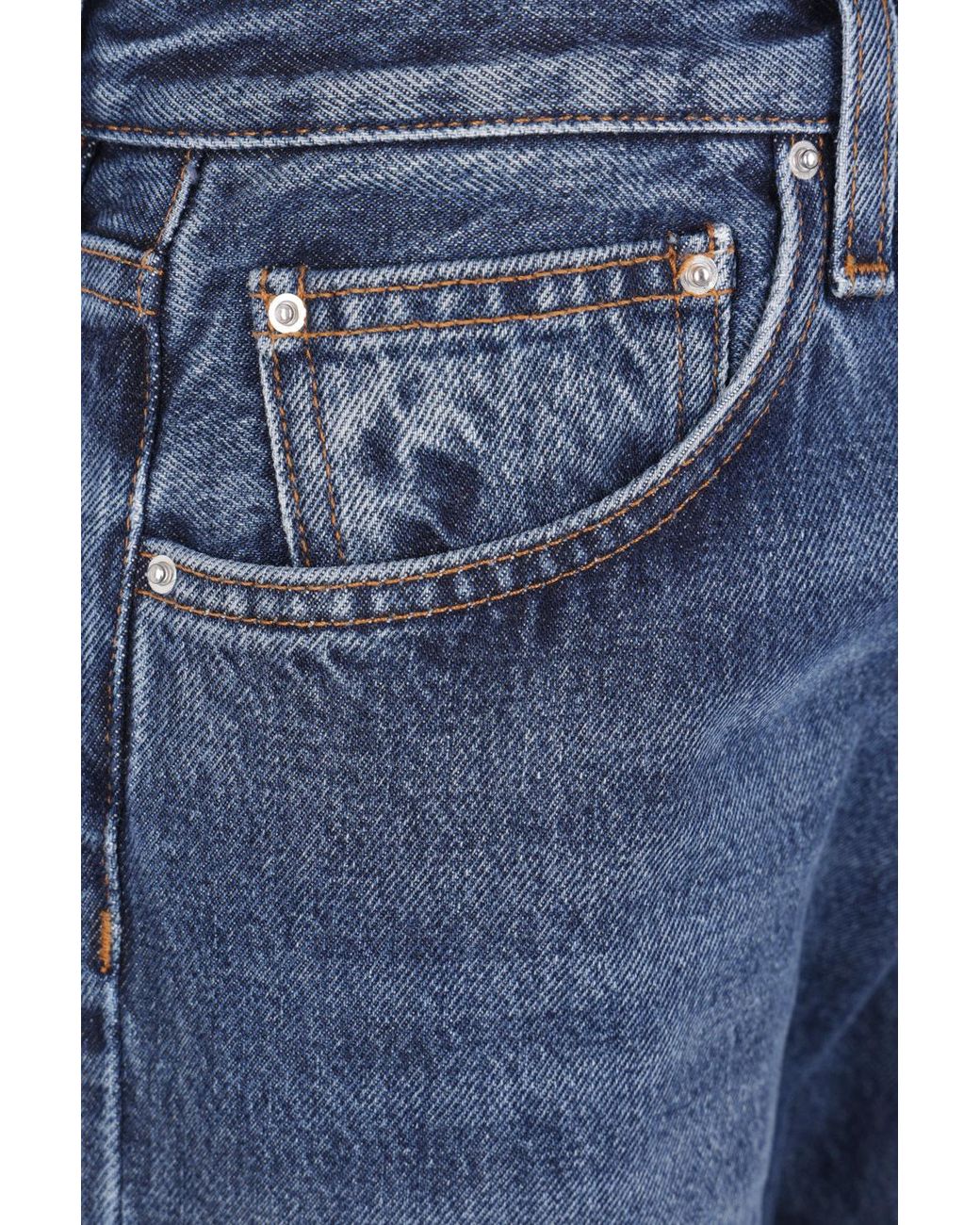 Totême  Blue Washed-Effect Twisted-Seam Jeans