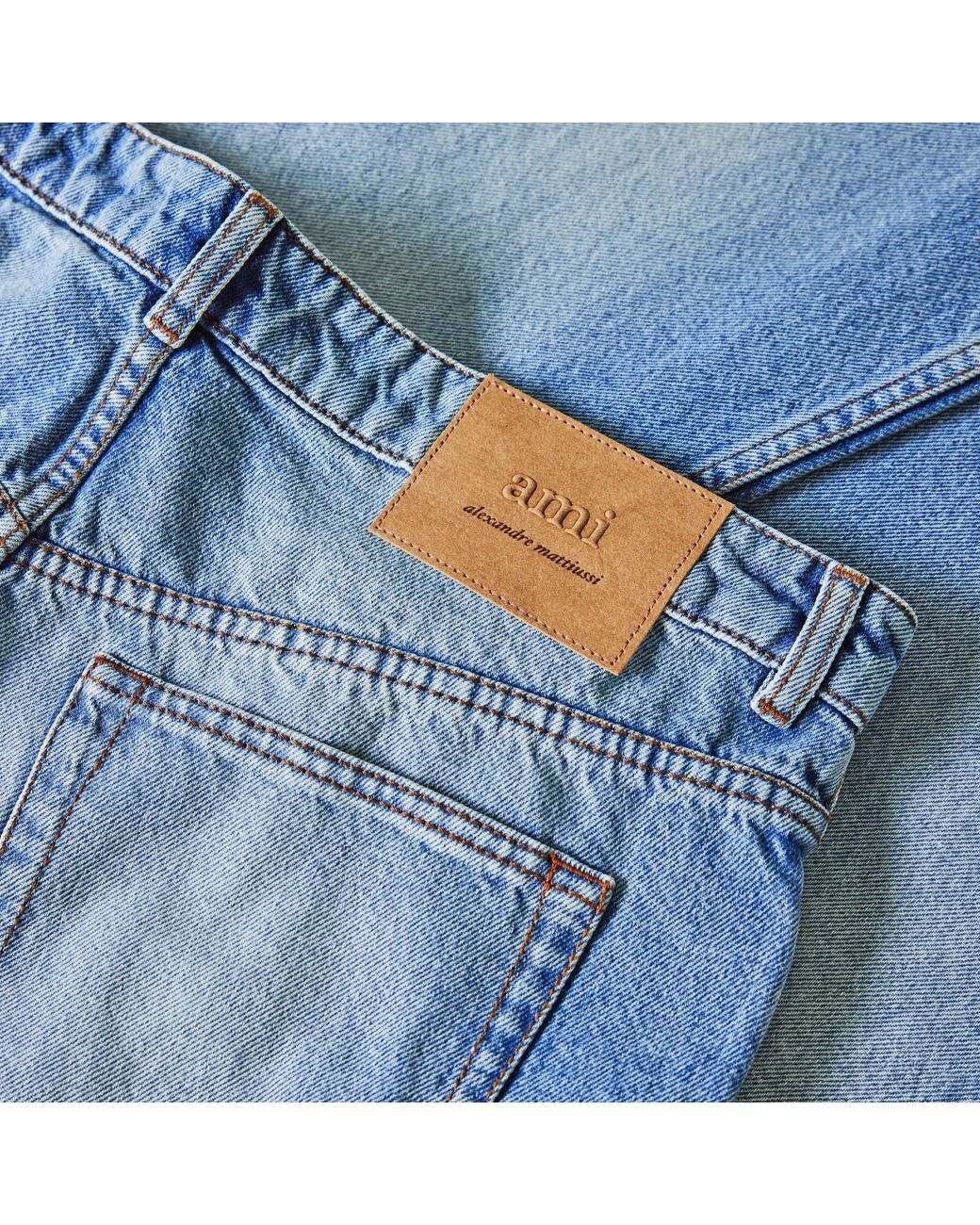 AMI Blue Solid Color Denim Long Pants for men