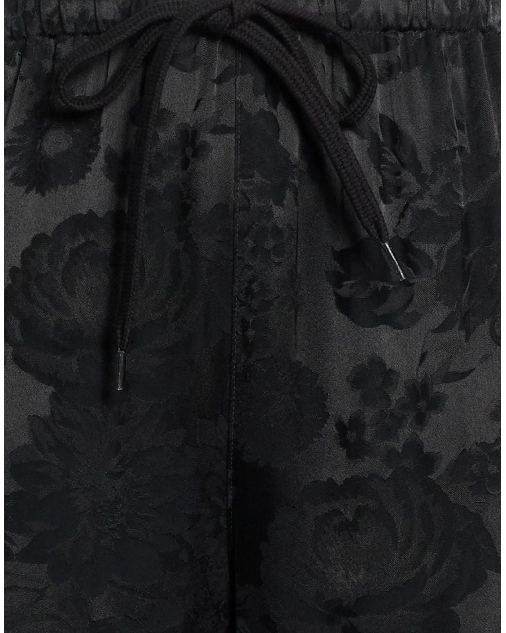 MM6 by Maison Margiela Black Loose Patterned Trousers