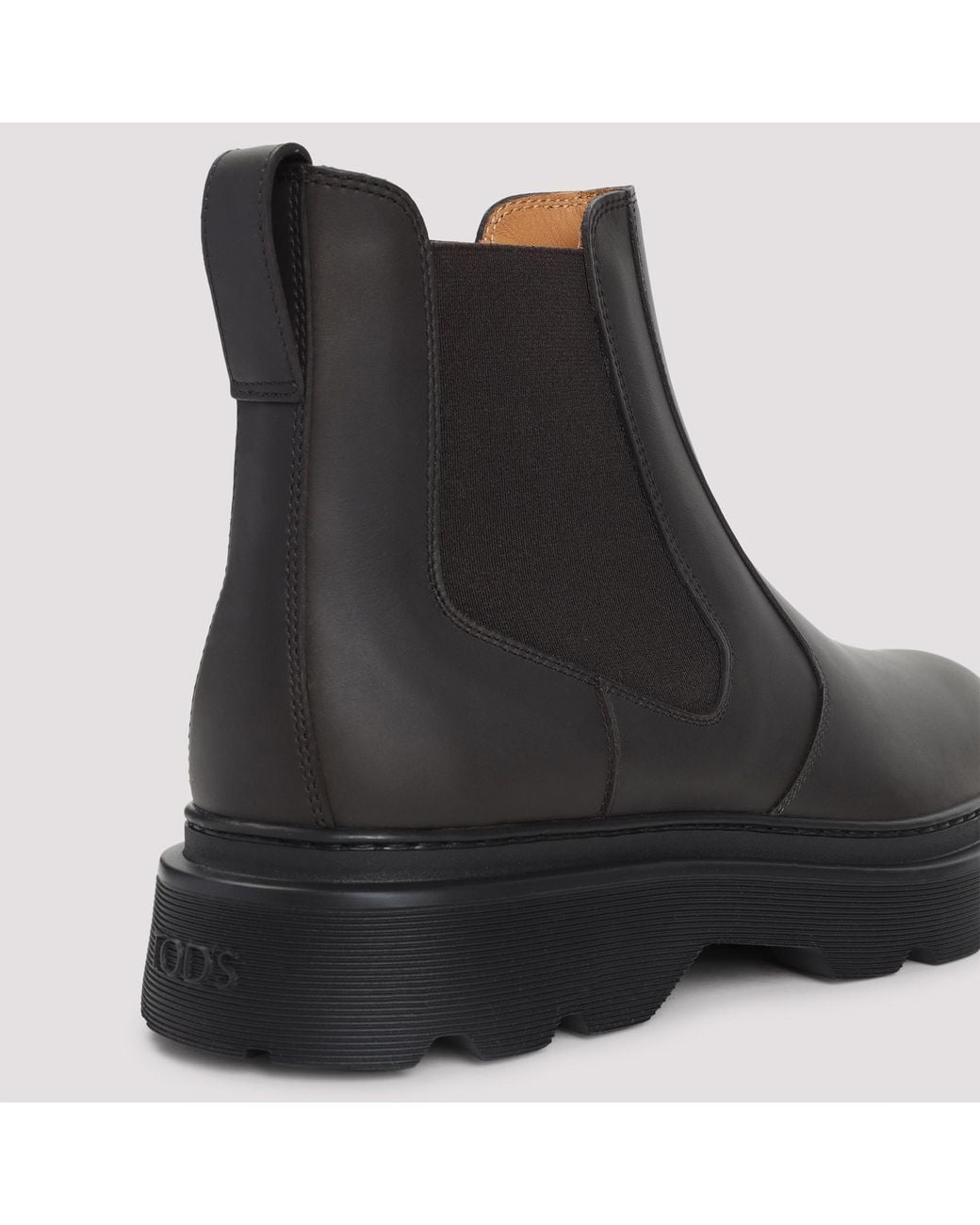 Tod's Black Round Toe Slip-On Ankle Boots for men